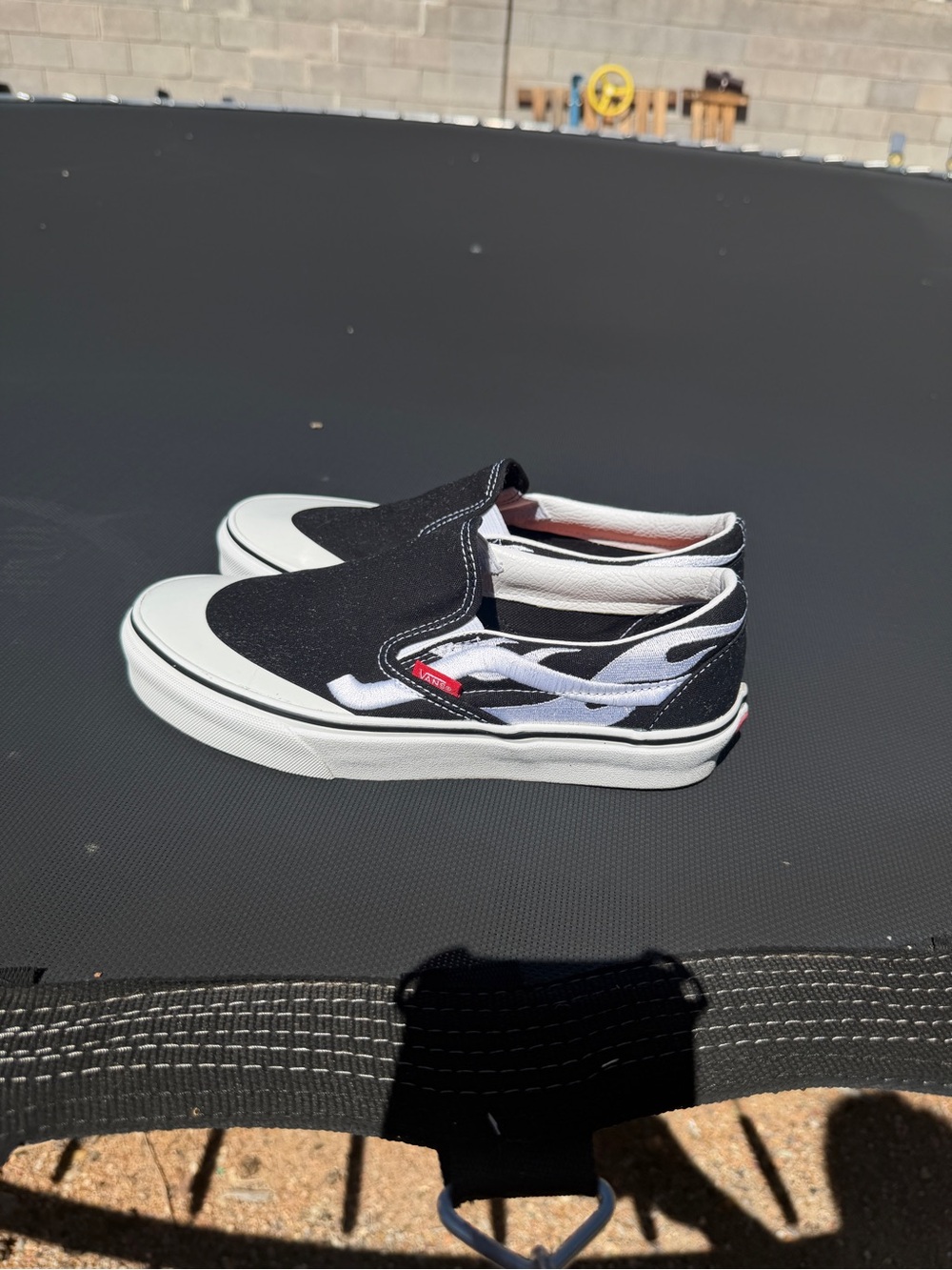 Vans Black and White Flame Slip-On Sneakers